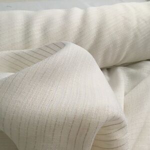 Fabric, sheer. White with beige lines. Bolt